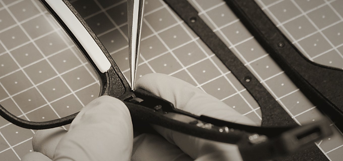 Close view of the temple of an OptimRise engineering-validation unit, showing the internal electronics.